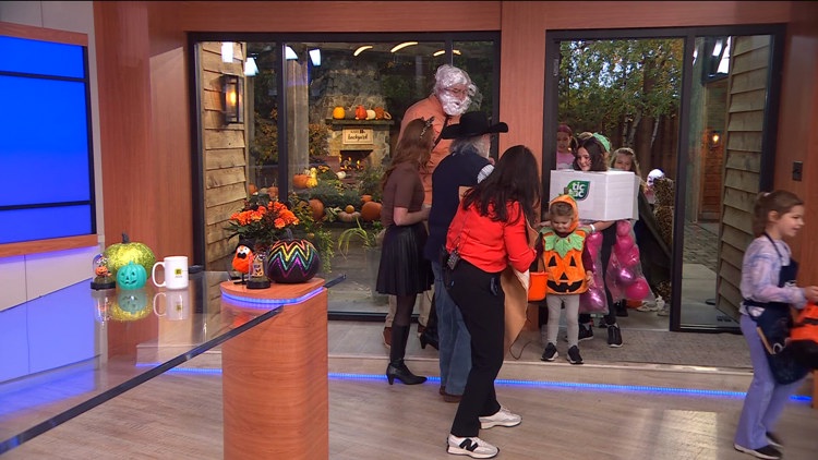 Children in costumes celebrating Halloween at KARE 11 in Minneapolis.